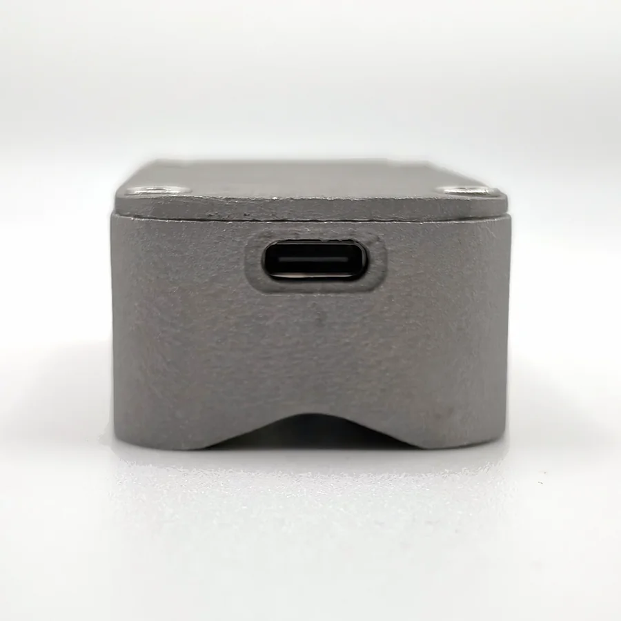 The USB-C port in the end of a real NOMAE tracker.
